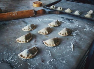 unbaked empanada on tray